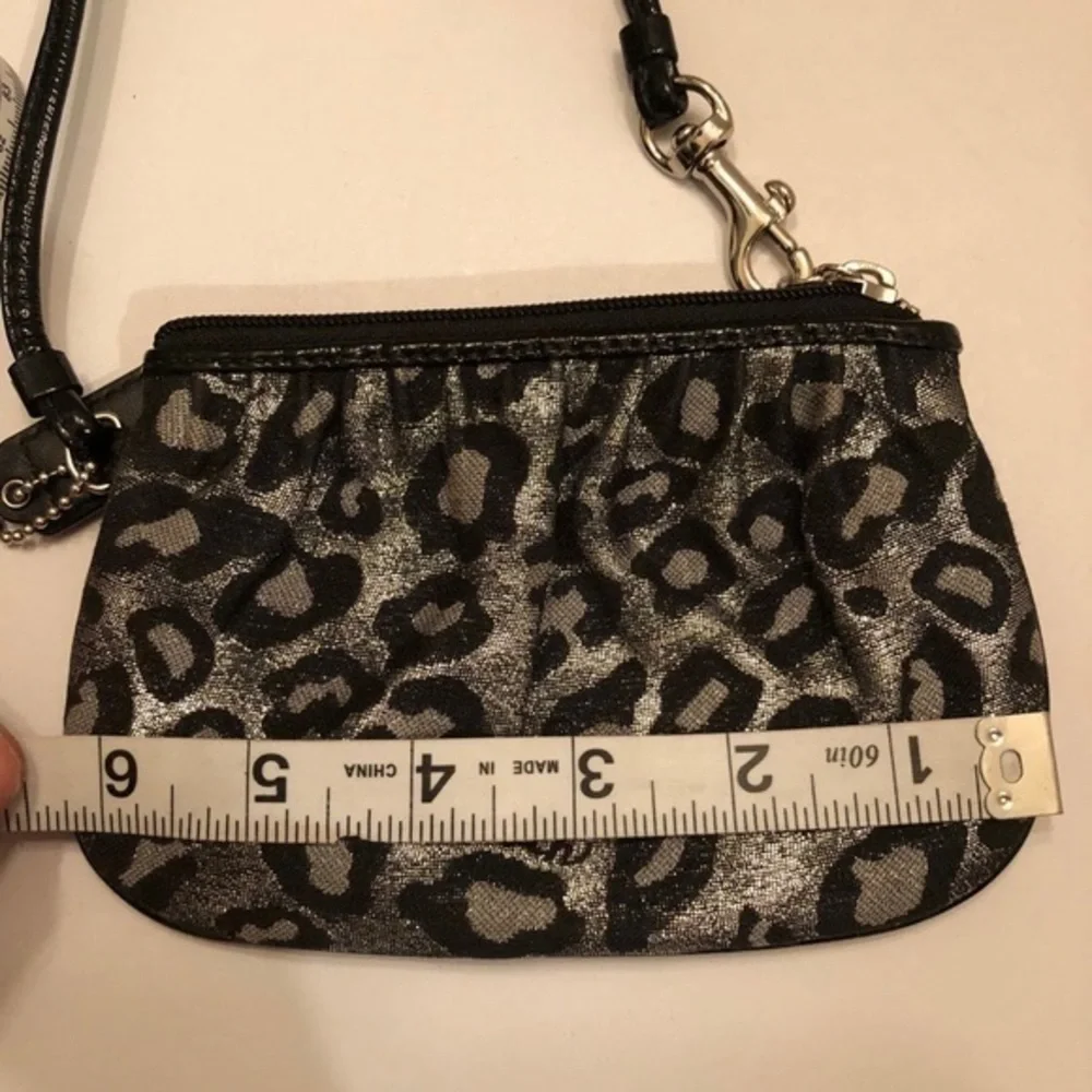 Coach black leopard wristlet metallic silver gray